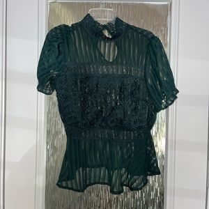 Beautiful high neck green sheer top with lace detail